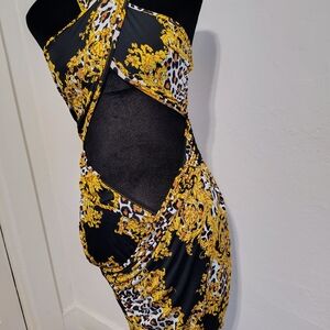 Elegant Black and Gold Cutout Dress